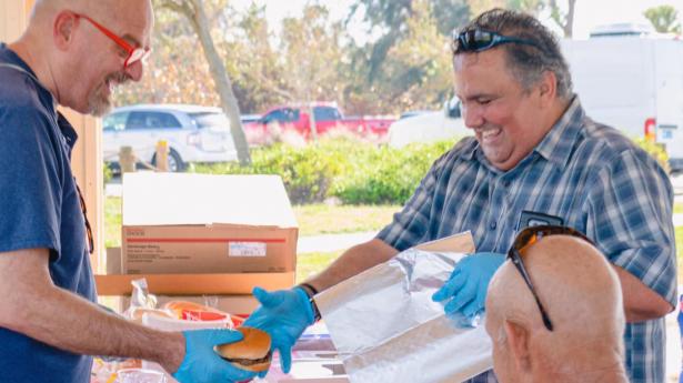 Lift Church distributing goods in Venice